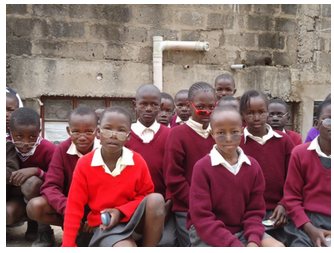 Children wearing donated eyeglasses.
Picture after a mission in Africa, from the official New Glasses website.