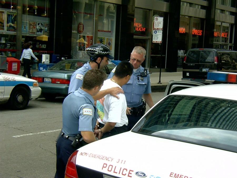 Image of man getting arrested
Source: A picture from Google Images
