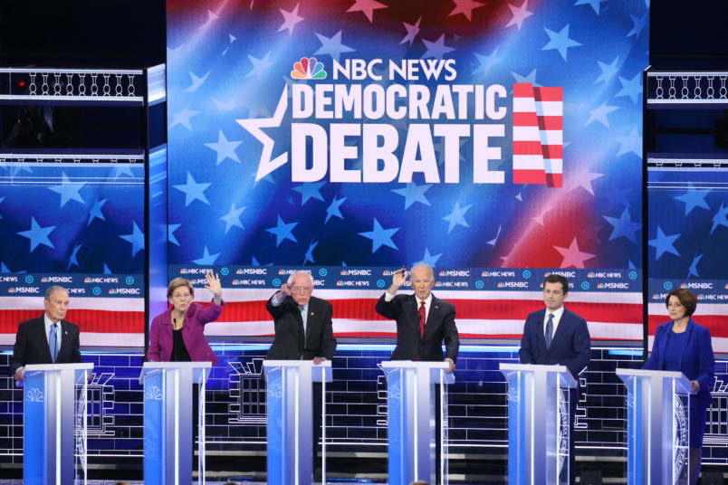 In a spectacular debate at the Paris Las Vegas resort, the Democratic candidates for president opened up new lines of attack on each other from healthcare to immigration, highlighting the bitter divides that still remain in the party. Pictured left to right are Michael Bloomberg, Elizabeth Warren, Bernie Sanders, Joe Biden, Pete Buttigieg, and Amy Klobuchar. Photo credits: Mario Tama/Getty Images.