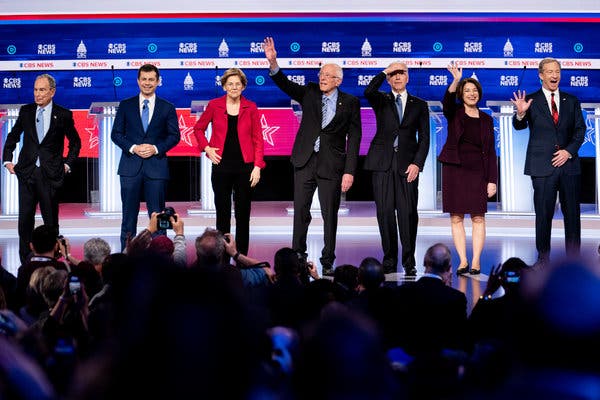 With the race for the Democratic nomination turning to crunch time as the South Carolina primary approaches and Super Tuesday looms, the candidates turned in feisty performances, frequently interrupting each other in the face of helpless moderators and an unfriendly audience. Pictured left to right: Michael Bloomberg, Pete Buttigieg, Elizabeth Warren, Bernie Sanders, Joe Biden, Amy Klobuchar, and Tom Steyer. Photo credits: Erin Schaff/The New York Times.