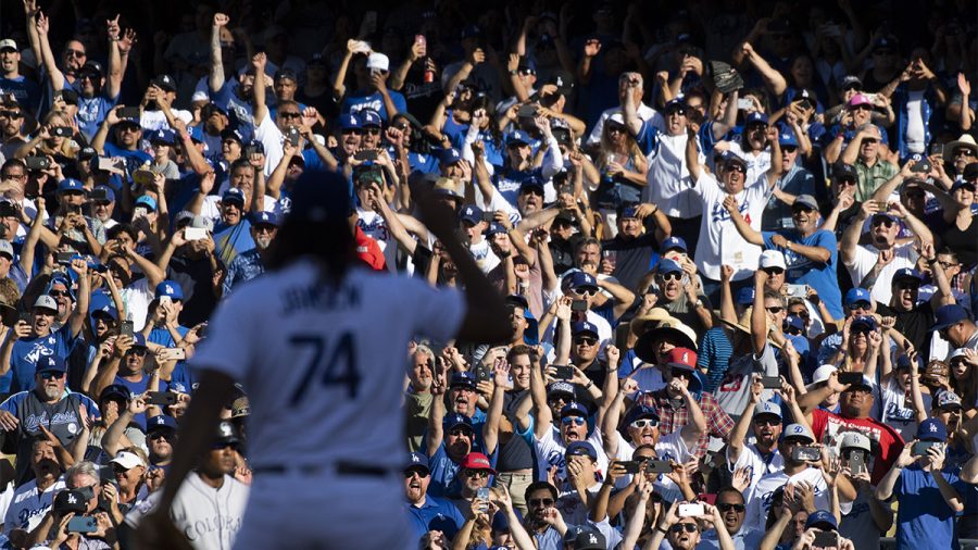 Baseball+fans+celebrate+a+win+by+their+favorite+team.+%28Photo+by+Kevin+Sullivan%2FDigital+First+Media%2FOrange+County+Register+via+Getty+Images%29