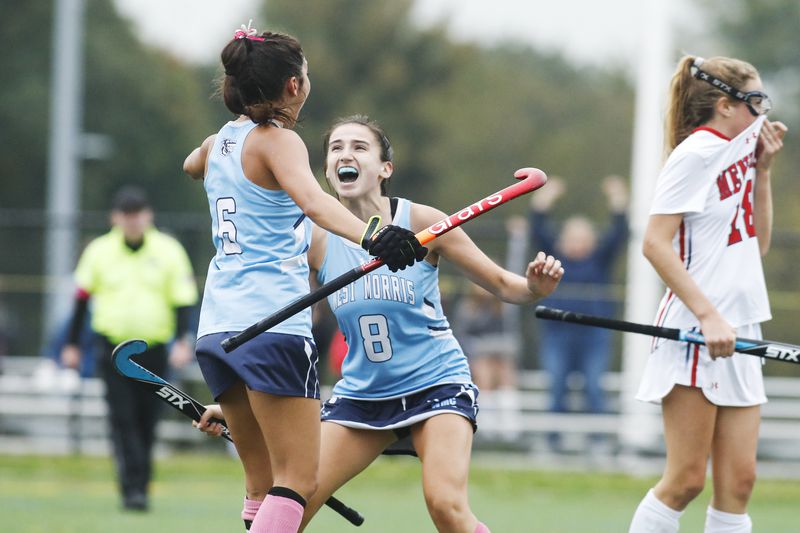Maggie Goldberg (right) and Julia Carbon(Left) celebrate after a goal 