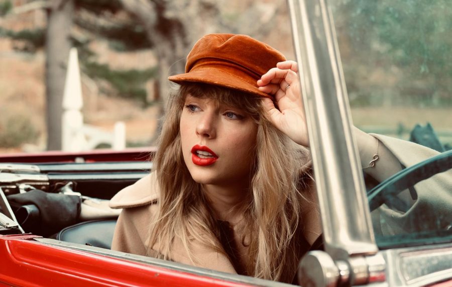 Taylor+Swift+posing+for+her+album+Red+%28Taylors+Version%29.+Photo+Courtesy+of+Taylor+Swift+