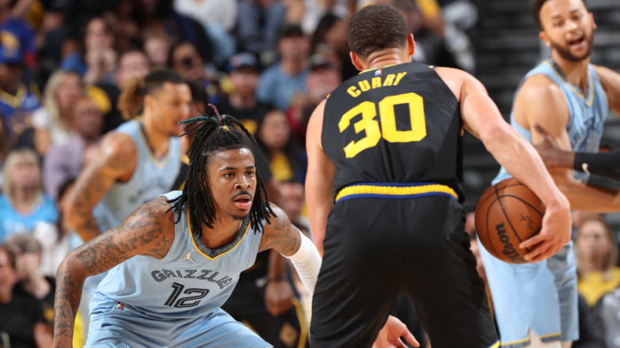 Ja Morant guards Stephen Curry in game 3 of the Western Conference Semifinals. 