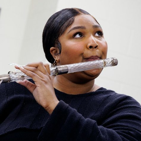 Lizzo playing flute photocred. Texas Monthly 