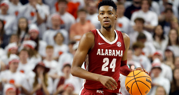 Alabama Star Basketball Player  Brandon Miller Dribbling Up The Court