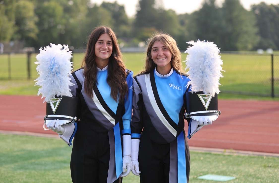 Sarah Tupaczewski and Madison Galluzzo in their marching Band Uniform