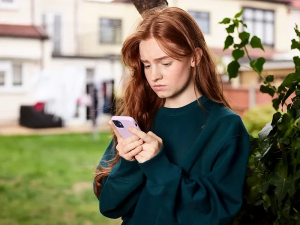 A girl uses her cellphone.