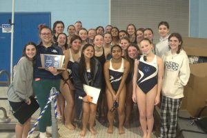 West Morris Central Girls Swim Team poses for a picture after winning State Sectionals! They were so happy to have made WMC history.  "I was really happy.  I think I was expecting it, because there's a lot of players on our team that are really, really good. It was really nice though, winning that," said freshman Naisha Prasad.